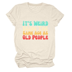 Detail view of cotton t-shirt with retro slogan It's Weird Being The Same Age As Old People