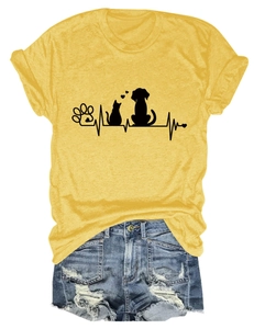 Flat lay of yellow cotton T-shirt with black pet paw heartbeat print and denim shorts