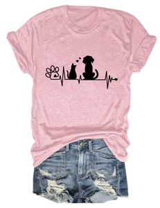 Pink crew neck t-shirt with heart rate and paw prints paired with denim shorts