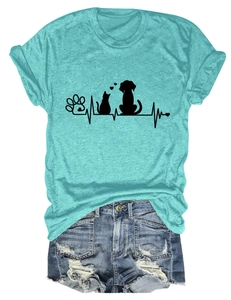 Flat lay of mint green pet print T-shirt and distressed ripped denim shorts with cat whiskers