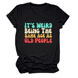 Close-up of retro colorful text print on a black cotton crew neck casual T-shirt