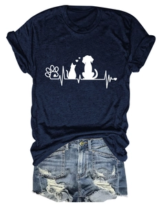 Detailed flat lay of navy t-shirt featuring white pet paw print and heartbeat graphics