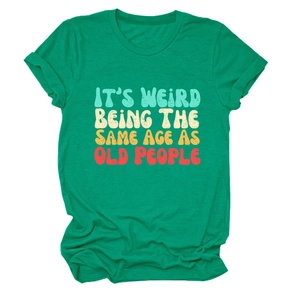 Close-up of green cotton t-shirt with colorful vintage slogan print and fine stitching