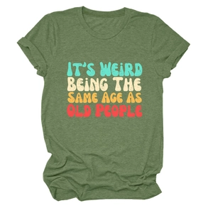 Detail of green heather t-shirt with retro 'It's weird being the same age as old people' text