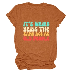 Detail of caramel cotton T-shirt featuring 'IT'S WEIRD BEING THE SAME AGE' slogan print