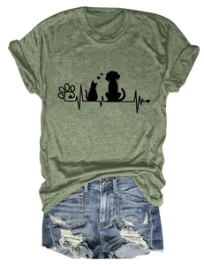 Flat lay of green cotton T-shirt with black pet heartbeat print and denim shorts