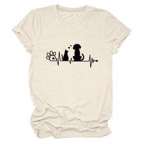 Detail of apricot crewneck T-shirt featuring black cat dog paw and heartbeat prints