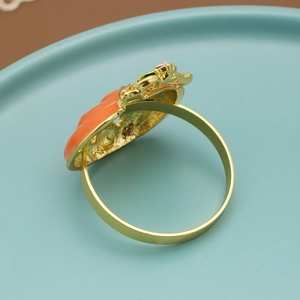 Halloween pumpkin napkin ring with orange enamel and crystal on a gold circular band