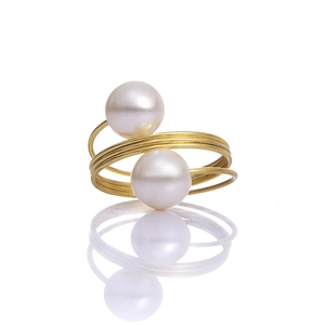 Elegant gold-plated spring napkin ring with double white pearls for luxury table decor
