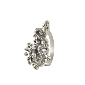 Silver dragon napkin ring featuring detailed scales and vintage finish for table decor
