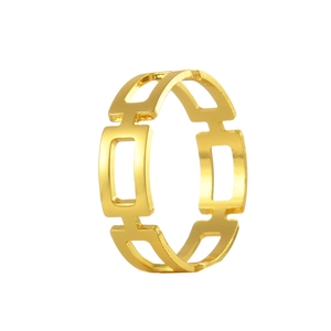 Modern gold hollow rectangular geometric napkin ring with a sleek metallic finish