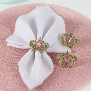 Luxurious gold crown napkin rings with pink crystals for wedding table decoration