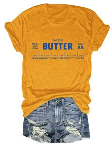 Détail du t-shirt jaune moutarde avec un design graphique créatif Salted Butter