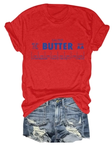 Detail of red Salted Butter cotton t-shirt with vintage print and ripped denim shorts