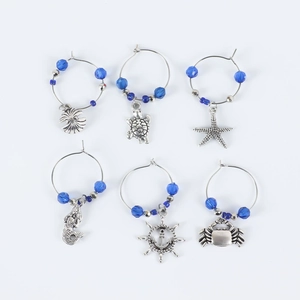 Set of 6 blue ocean themed wine glass charms with silver seashell and starfish pendants