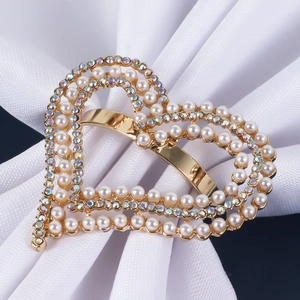 Golden heart napkin ring with pearls and rhinestones for elegant wedding table settings