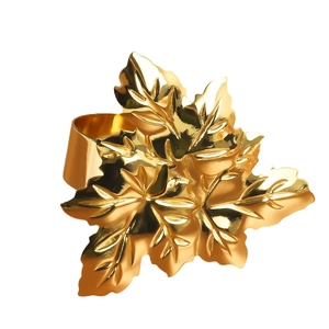 Elegant gold maple leaf napkin ring with polished metal finish for table settings