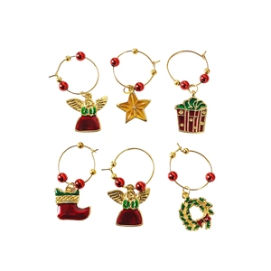 6-piece Christmas wine glass charm set with festive alloy pendants for party table decor