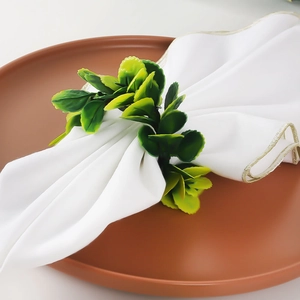Handmade artificial green leaf napkin ring for elegant forest themed table decor