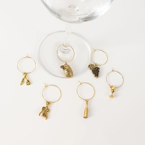 Set of 6 gold wine glass charms with wine-themed pendants for party identification