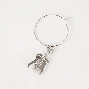 Close-up of creative silver hoop wine glass marker with miniature corkscrew charm