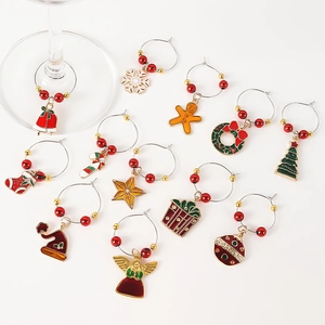 Set of 12 festive Christmas wine glass charms featuring colorful holiday alloy pendants