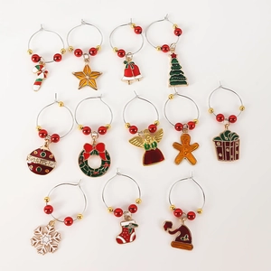 12-piece Christmas wine glass charms set with festive enamel pendants and colored beads