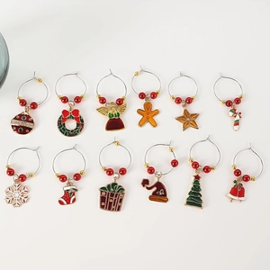Set of 12 Christmas wine glass charms with festive pendants for party table decoration