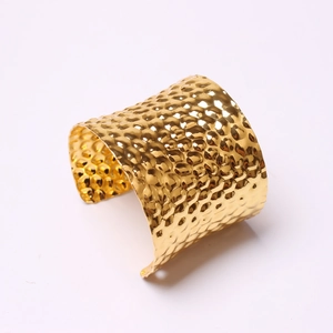 Elegant gold-tone hammered metal napkin ring for luxury dining table decor and events