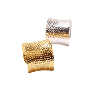 Minimalist hammered alloy napkin rings in gold and silver for elegant table settings