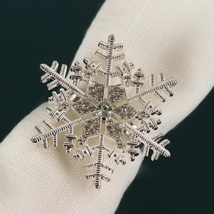 Elegant silver snowflake napkin ring with rhinestones for festive hotel table decor