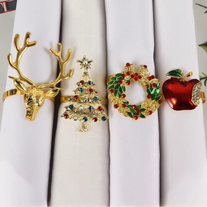 Christmas napkin ring set featuring reindeer, Christmas tree, wreath and red apple