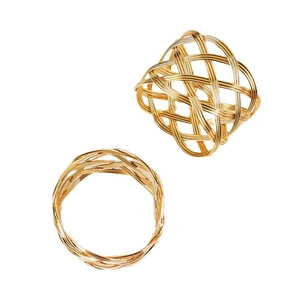 Handwoven gold wire mesh napkin ring with a hollow spherical metal weave design