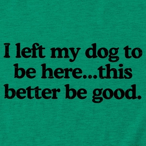 Detail of green knit T-shirt featuring 'I left my dog to be here' slogan print
