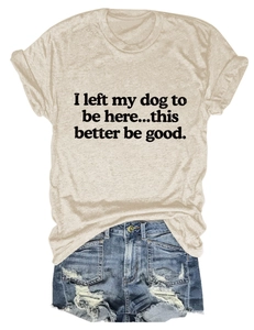 Detail of beige crew neck tee with 'I left my dog' print and ripped denim shorts