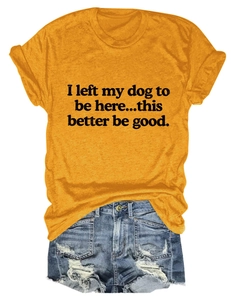 Flat lay detail of a yellow crew neck t-shirt with print and ripped denim shorts