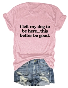 Flat lay of pink cotton t-shirt with dog slogan and ripped denim shorts in summer set