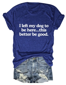 Flat lay of royal blue crew neck T-shirt with white humor slogan and ripped denim shorts