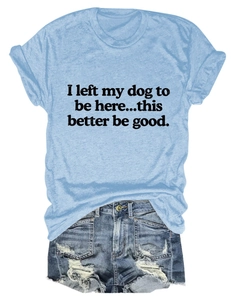 Close-up of light blue cotton T-shirt with text print and distressed denim shorts