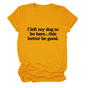 Detail of mustard yellow crew neck cotton T-shirt with black letter print and rolled cuffs
