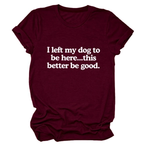 Detail of maroon crew neck t-shirt featuring 'I left my dog to be here' slogan print