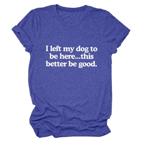 Close-up of royal blue cotton T-shirt with white I left my dog text and rolled sleeve cuff