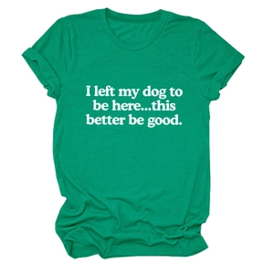 Detail of green cotton T-shirt featuring white slogan print and ribbed crew neckline