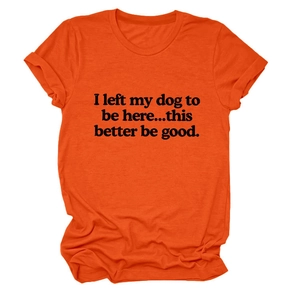 Detail of soft orange cotton T-shirt featuring a humorous black dog quote on the front