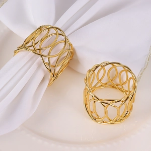 Golden woven X-shaped cutout metal napkin rings set of two for elegant table decoration