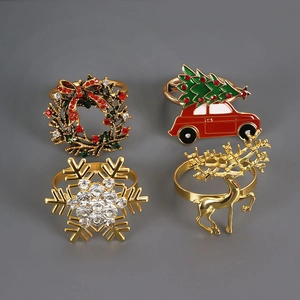 Christmas napkin ring set featuring wreath, vintage car, snowflake, and reindeer designs