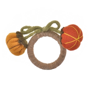 Handmade pumpkin napkin ring with knitted bow and felt decorations for Halloween table decor