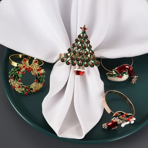 Set of 4 Christmas napkin rings featuring tree, wreath, hat and boot with crystals