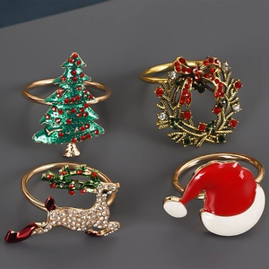 Christmas napkin rings set featuring gold alloy tree wreath reindeer and hat designs
