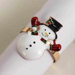 Christmas snowman napkin ring in gold alloy with colorful enamel for festive table decor